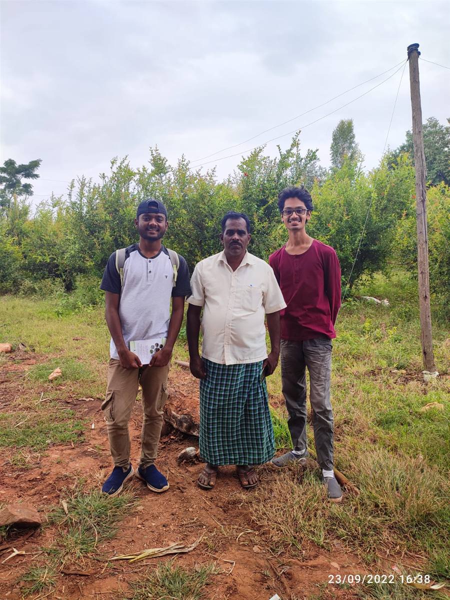 Prakheti team documenting traditional farming practices with a farmer in Shoolagiri